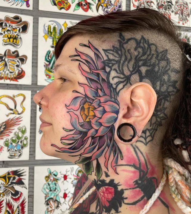 Flower on the face and head — tattoo at Stingray Tattoo, Regina