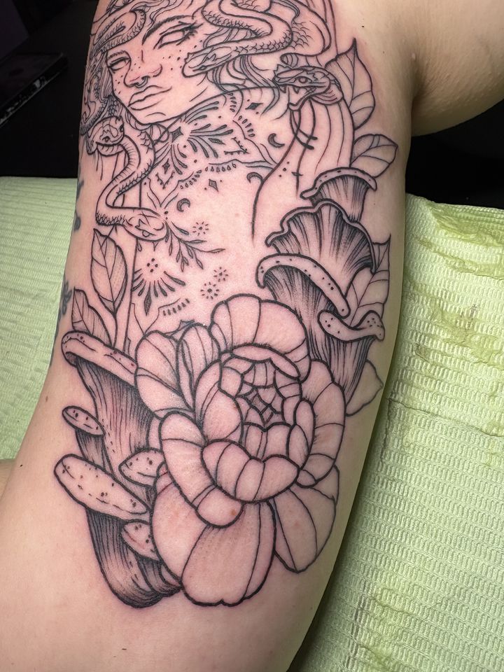 Medusa with peony and mushrooms, tattoo by Lisa Loewen at Stingray Tattoo, Regina