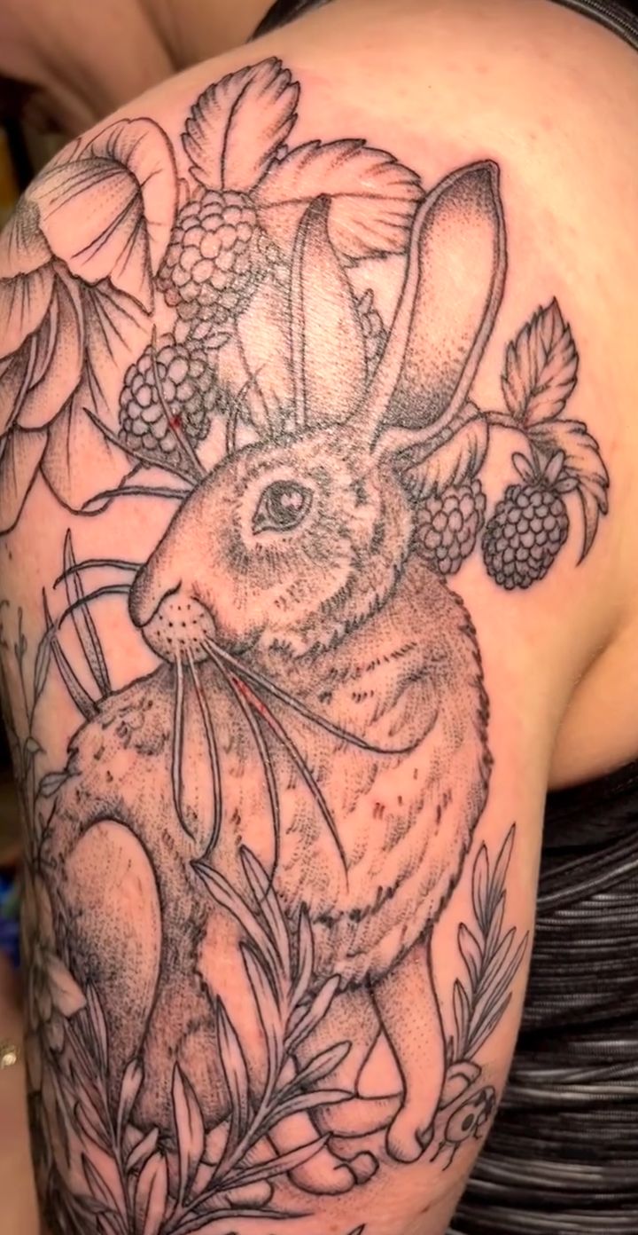 Hare with blackberries, upper arm, tattoo by Lisa Loewen at Stingray Tattoo, Regina